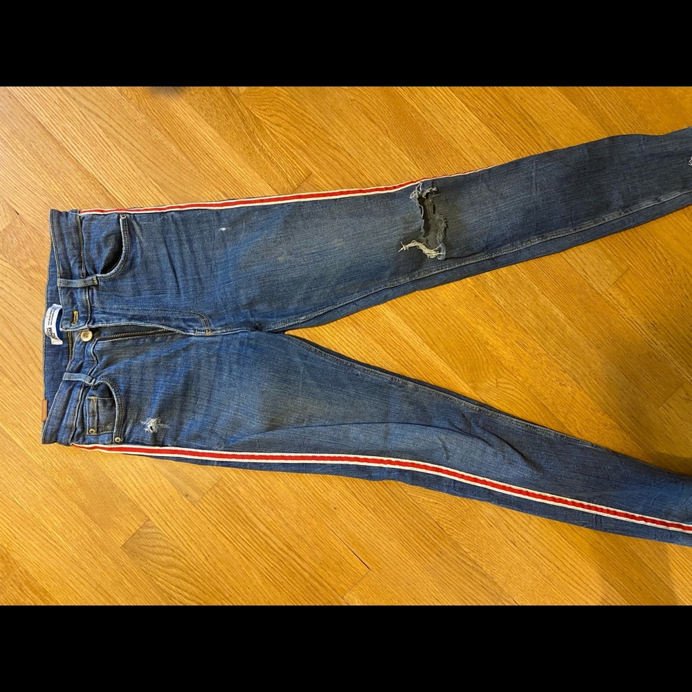 High-waisted skinny Zara denim jeans with red stripe on each leg’s side